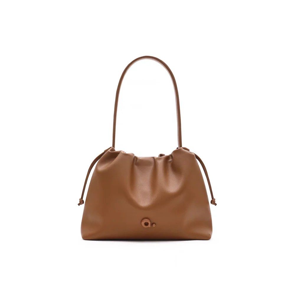 Muva Brown Leather Tote Bag (Category: Tote Bags) located in Mandaluyong City. Submitted by mainesells_ (Listing ID 1439349150, Image 1). Description: - Gifted from Thailand - Unused, just stored in cabinet - No chipping or issues, will try to find dustbag / other original inclusions.