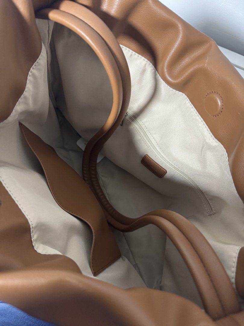 Muva Brown Leather Tote Bag (Category: Tote Bags) located in Mandaluyong City. Submitted by mainesells_ (Listing ID 1439349150, Image 3). Description: - Gifted from Thailand - Unused, just stored in cabinet - No chipping or issues, will try to find dustbag / other original inclusions.