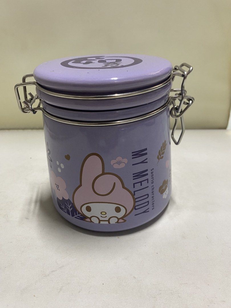 My Melody Storage Jar (Category: Storage Boxes & Baskets) located in Pasacao. Submitted by wengpullar37205 (Listing ID 1439393264, Image 1). Description: - My Melody storage jar - Lavender color - Secure metal clasp closure - Matching lid - Ideal for storing small items - Sanrio character item.