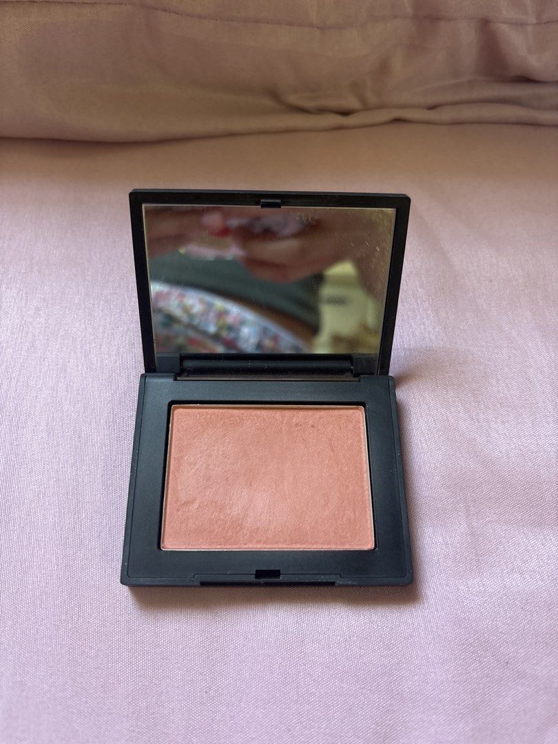 NARS Orgasm Edge Blush (Category: Makeup) located in Binan City. Submitted by kpreloved___ (Listing ID 1439317828, Image 1). Description: - NARS Orgasm Edge blush - Iconic peachy-pink shade - Comes in a sleek black compact with a mirror - Rectangular compact design - Authentic, bought for ₱2250 Refillable case.
