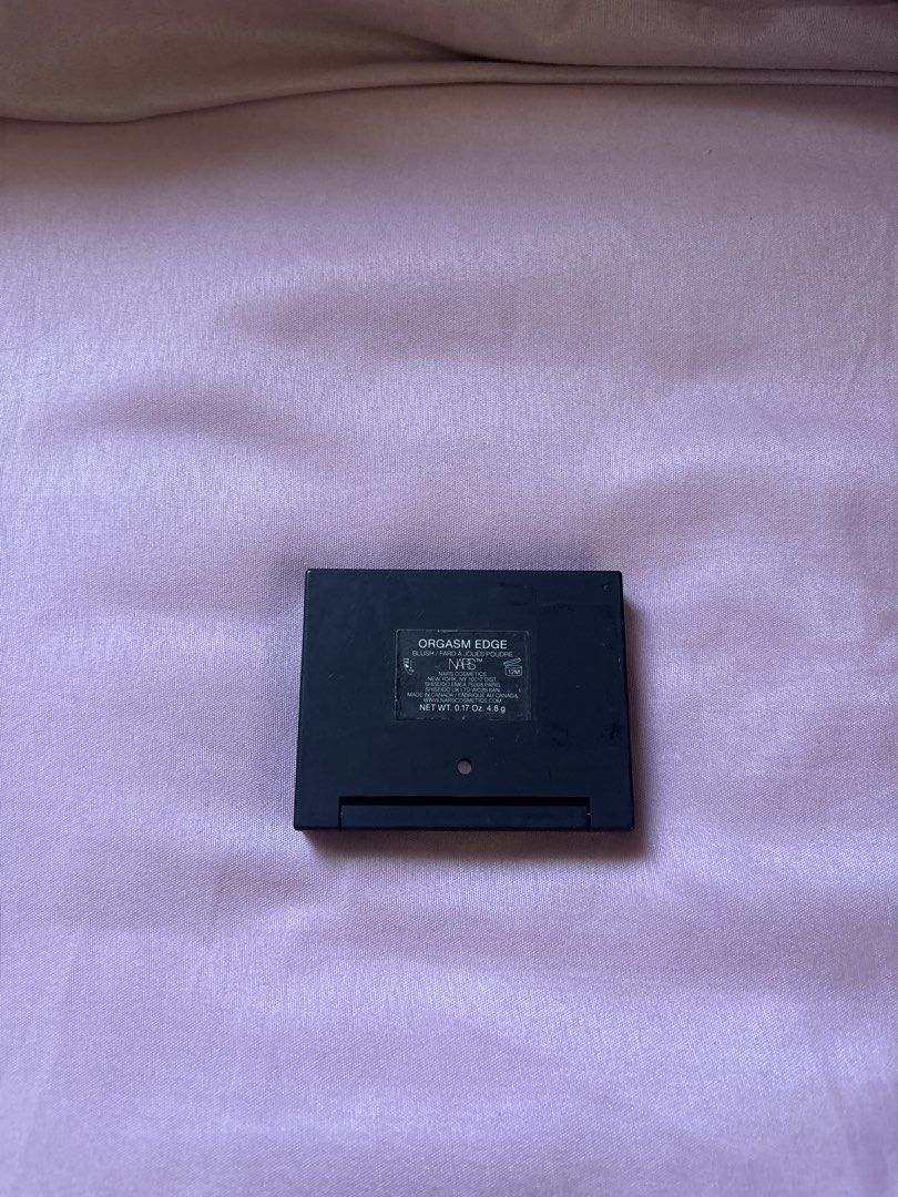 NARS Orgasm Edge Blush (Category: Makeup) located in Binan City. Submitted by kpreloved___ (Listing ID 1439317828, Image 3). Description: - NARS Orgasm Edge blush - Iconic peachy-pink shade - Comes in a sleek black compact with a mirror - Rectangular compact design - Authentic, bought for ₱2250 Refillable case.
