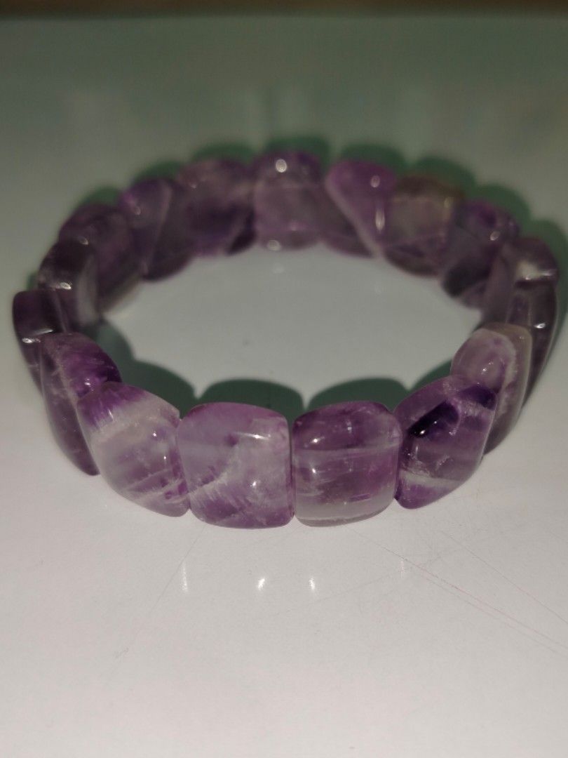 Natural Amethyst Soft bangle (Category: Bracelets) located in Rizal. Submitted by collectibles999 (Listing ID 1439270686, Image 1). Description: 👉 No flaw for the beads 👉 Mid quality 👉 Has some rainbows 👉 Issue: Lost bottom string (will provide extra string for you to diy).