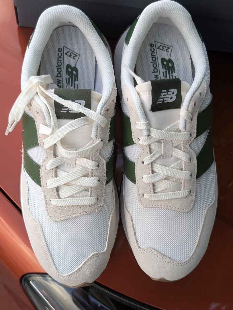 New Balance 237 Sneakers - White/Green (Category: Sneakers) located in Quezon City. Submitted by watchalternativeph (Listing ID 1439349908, Image 3). Description: - New Balance 237 - White and green colorway - Mesh upper with suede overlays - Iconic 'N' logo - Light cream sole with brown outsole - Comes with original box -Size 10US Men Available for other sizes upon request.