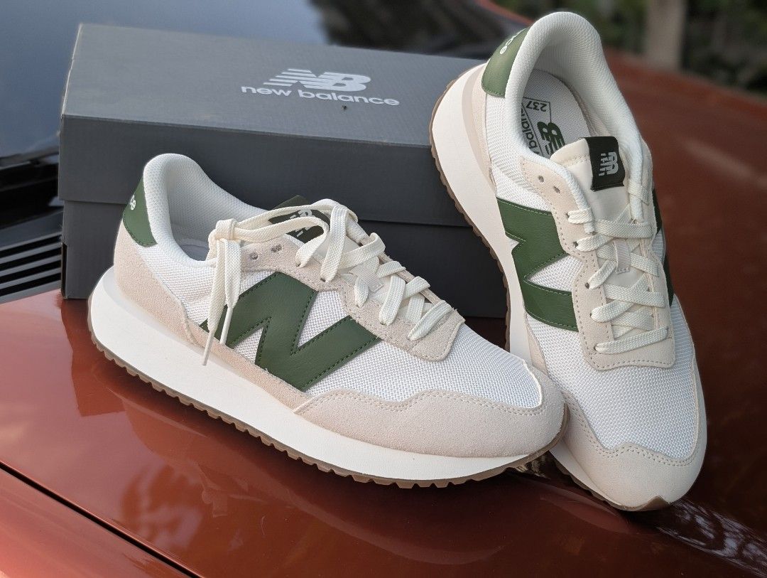New Balance 237 Sneakers - White/Green (Category: Sneakers) located in Quezon City. Submitted by watchalternativeph (Listing ID 1439349908, Image 1). Description: - New Balance 237 - White and green colorway - Mesh upper with suede overlays - Iconic 'N' logo - Light cream sole with brown outsole - Comes with original box -Size 10US Men Available for other sizes upon request.