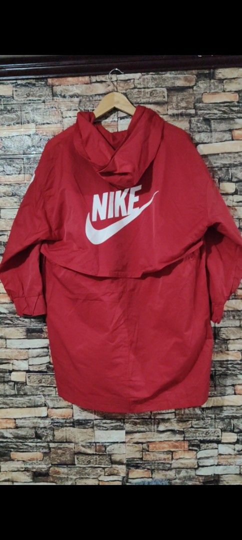 Nike Adidas Red Jacket (Category: Coats, Jackets and Outerwear) located in Manila. Submitted by adrian2325 (Listing ID 1439412245, Image 2). Description: - Red jacket - Nike logo on front and back - Adidas stripes on sleeves - Hooded - Zipper closure - Drawstrings at waist - Longer style.