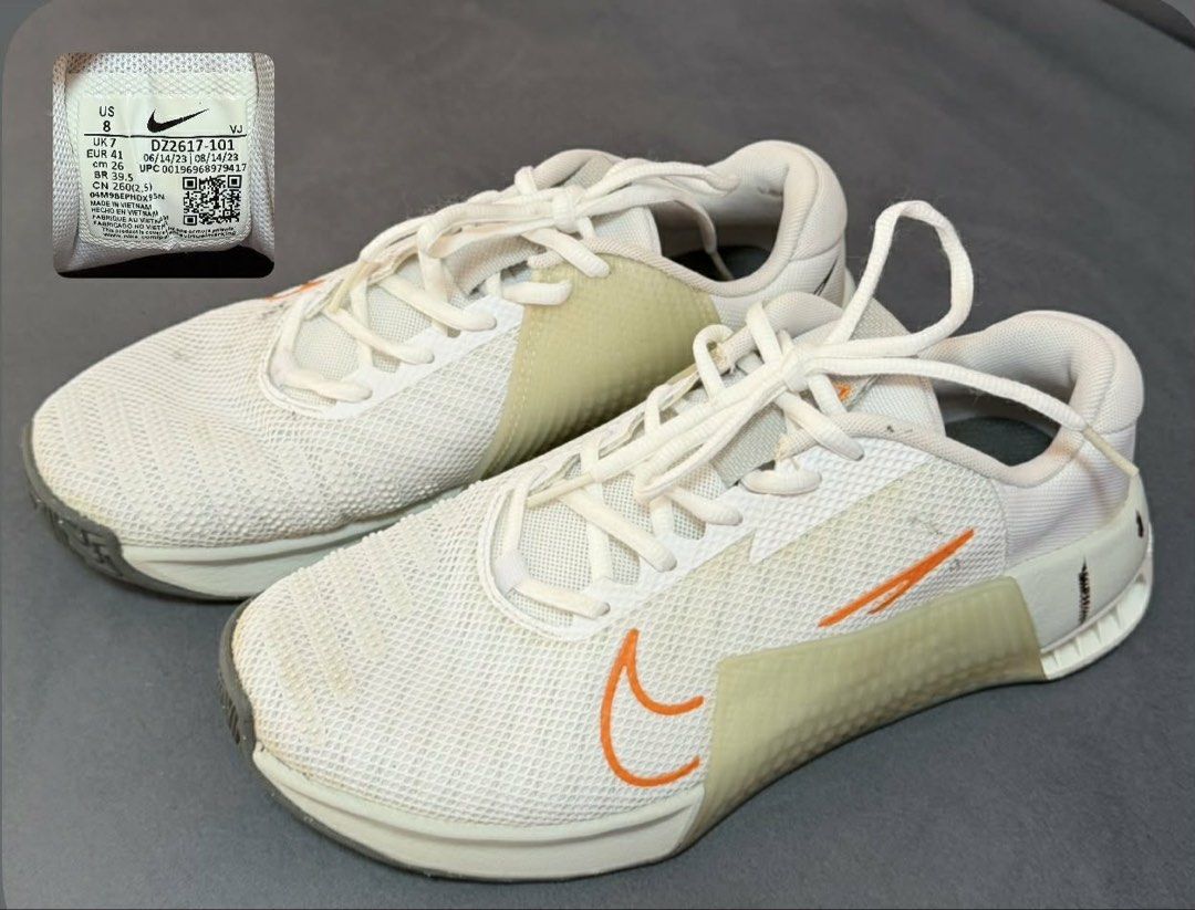 Nike Metcon Training Shoes DZ2617-101 (Category: Sneakers) located in Panay. Submitted by patpat_07 (Listing ID 1439379199, Image 1). Description: ALL ORIGINAL SHOES NO BOX USE NOT MORE THAN A YEAR - Nike Metcon training shoes - Color: White with orange accents - Size: US 8, UK 7, EUR 41, CM 26 - Style code: DZ2617-101 - Features: White laces, white mesh upper, gray soles - Condition: Excellent.
