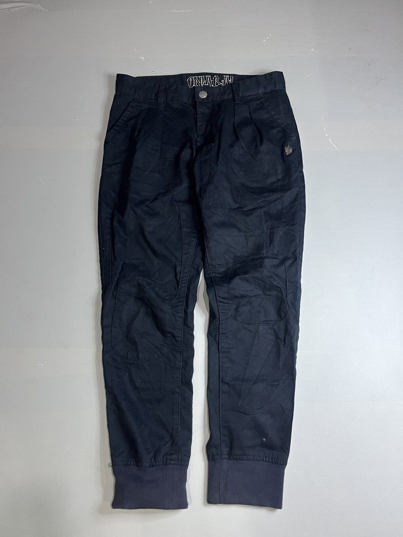 ONIARAI Skull Wing Pants (Category: Jeans) located in Mabalacat. Submitted by aas_thriftfings (Listing ID 1439342794, Image 2). Description: - ONIARAI black pants - Unique skull and wing design on the back - Size: M - Material: 100% cotton - Features: - Button closure - Pockets - Pleats - Logo detail - Ribbed cuffs.