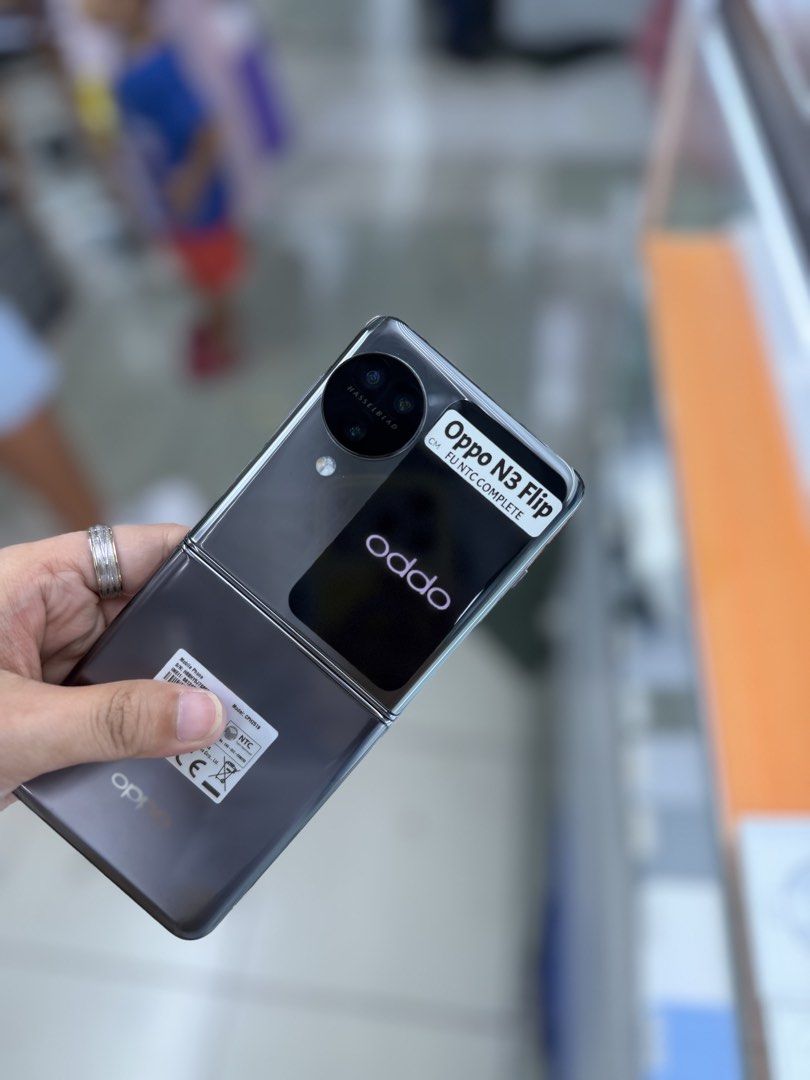 Oppo Find N3 Flip 12/256GB Openline complete no issues (Category: Other Gadgets) located in San Juan City. Submitted by najihahtelecomshop2018 (Listing ID 1439383390, Image 3). Description: Legit Store | Original unit FOR SALE | TRADE / SWAP ▫️INSTALLMENT thru: 🔸Credit Card (straight / installment) 🔸Ggives / Gcredit + 6% interest 🔸Spay Later + 6% interest (RFS: Buy and Sell any kinds of Gadgets) Description: Oppo Find N3 Flip 12/256GB NTC APPR