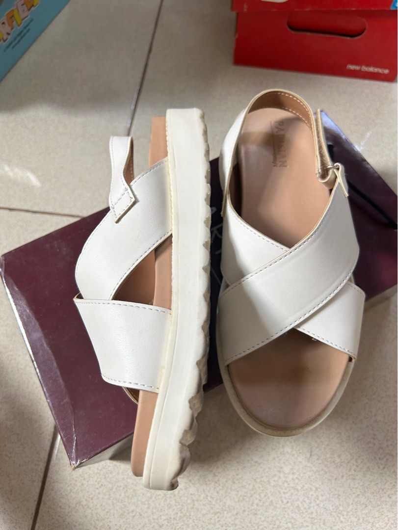 Parisian Sarah White Sandals size 7 (Category: Flats & Sandals) located in Rizal. Submitted by jhenz10 (Listing ID 1439281507, Image 2). Description: - Parisian sandals - White color - Criss-cross strap design - Platform sole - Size 7 US / EUR 37.