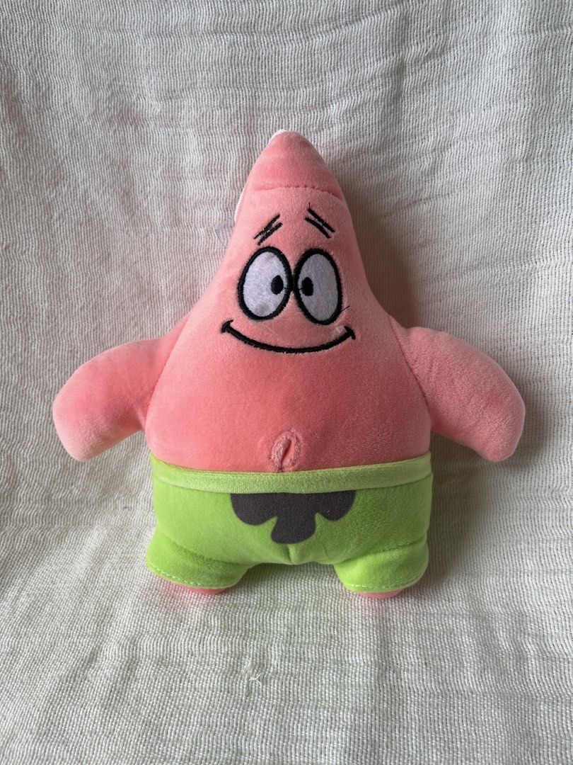 Patrick Star Plush Toy (Category: Plushies & Soft Toys) located in Manila. Submitted by prima_onda (Listing ID 1439294051, Image 2). Description: - Adorable Patrick Star plush. - Features Patrick's iconic pink color and green shorts. - Includes a convenient hanging loop. - Perfect for collectors and fans of the show. - Price is for each item. Buy more for larger discount! ⭐️ - Soft and huggable!.