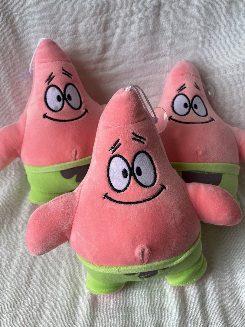 Patrick Star Plush Toy (Category: Plushies & Soft Toys) located in Manila. Submitted by prima_onda (Listing ID 1439294051, Image 1). Description: - Adorable Patrick Star plush. - Features Patrick's iconic pink color and green shorts. - Includes a convenient hanging loop. - Perfect for collectors and fans of the show. - Price is for each item. Buy more for larger discount! ⭐️ - Soft and huggable!.