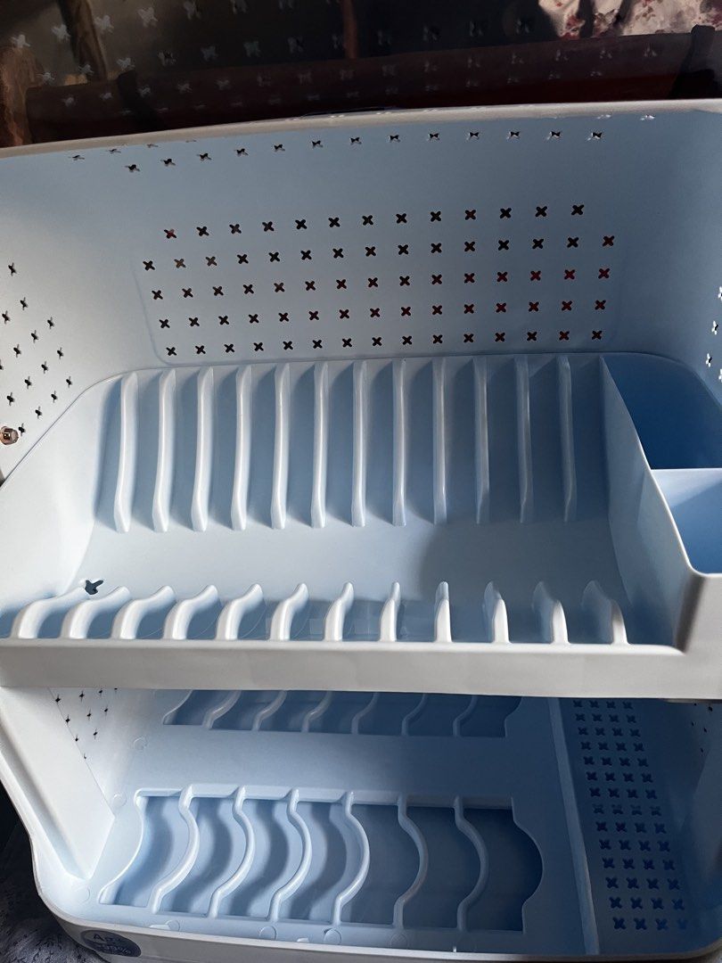 Pinyaoo Dish Rack with Cover (Category: Food Organization & Storage) located in Manila. Submitted by charles.carlcustomizedshop (Listing ID 1439279820, Image 2). Description: - Two-tiered Pinyaoo dish rack - Includes a clear cover - Features slots for plates and bowls - Separate compartment for utensils - Blue and white color - Made of plastic - Drainage system to keep dishes dry.