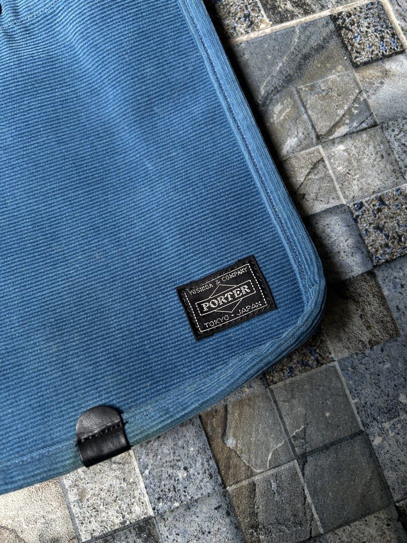 Porter Corduroy Tote Bag (Category: Tote Bags) located in Quezon City. Submitted by commonwealthpickerph (Listing ID 1439308561, Image 3). Description: Porter Corduroy Tote Bag - 7 width // 8.5 length - Corduroy material - Single button closure - Comfortable shoulder strap - Rectangular shape with rounded corners - Porter logo visible - Light blue interior lining - Perfect for everyday use - in excellent condition - need wash .