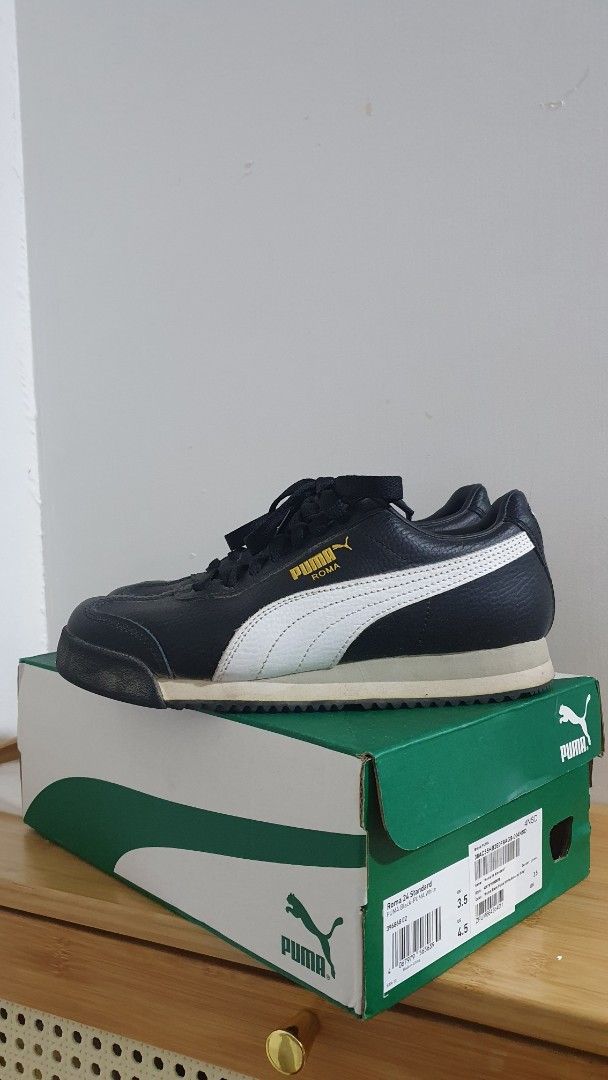 Puma Roma 24 - Unisex (Category: Sneakers) located in Makati City. Submitted by binkydot (Listing ID 1439396486, Image 2). Description: - Classic Puma Roma sneakers - Size: UK 3.5 / US 4.5 / EU 36 - Color: White-Smokey Gray - Includes original box - Good condition, just needs cleaning lol - 1st photo taken from Puma's website.