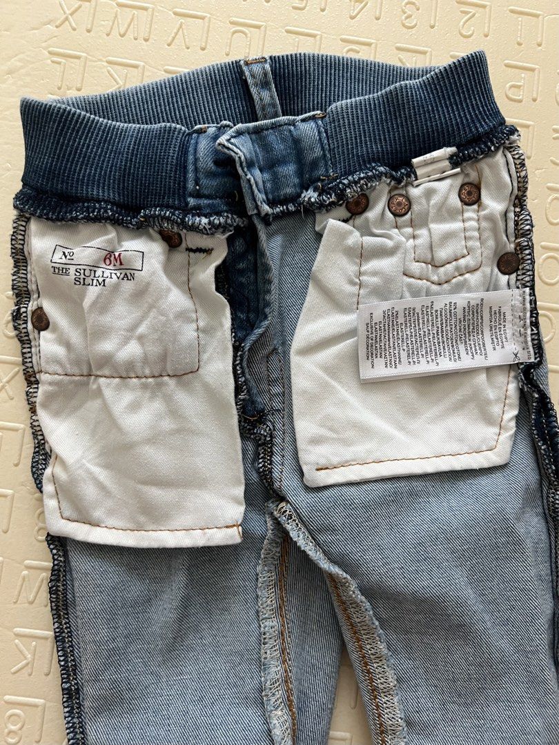 Polo Ralph Lauren Jeans (Category: Babies & Kids Fashion) located in Pasig City. Submitted by justdeclutter_777 (Listing ID 1439318035, Image 3). Description: SF c/o buyer Size on tag: 6M My son used it until 11 months since the denim is stretchy and he’s petite 🤍 Super comfy fit! Last price posted .