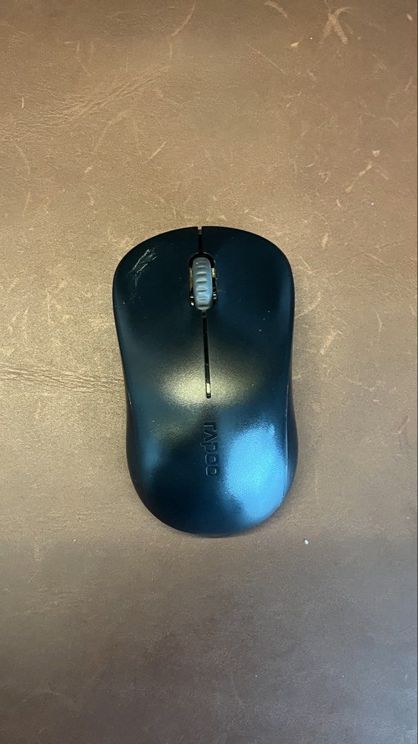 Rapoo Wireless Mouse (Category: Mouse & Mousepads) located in San Juan City. Submitted by kaelarafer (Listing ID 1439405217, Image 1). Description: Rapoo Wireless Mouse Used a few times only No flaws; just needs some cleaning RFS: Decluttering .