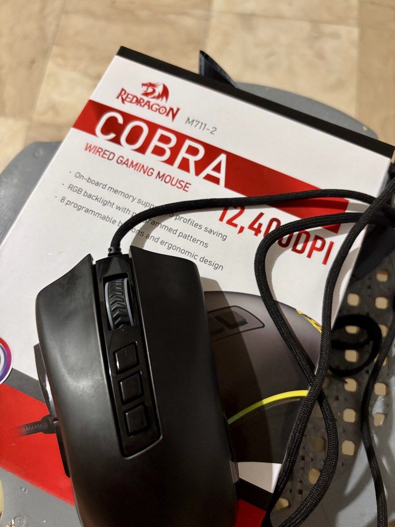 Redragon Cobra Wired Gaming Mouse M711-2 (Category: Mouse & Mousepads) located in Rizal. Submitted by stockroom_ph (Listing ID 1439261300, Image 1). Description: - Redragon Cobra Gaming Mouse - Wired connection - Customizable RGB backlight - 8 Programmable buttons - 12,400 DPI for precision - On-board memory for profile saving - Lightly used for 2 months - Bought from Datablitz - Last price already posted (huwag na po tumawad, thanks!).