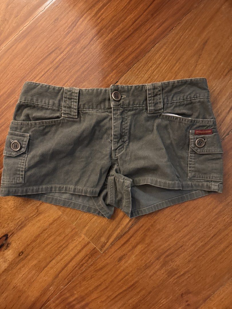 Roxy Jean Corduroy Shorts Size 5 (Category: Shorts) located in Quezon City. Submitted by shoppingaddict444 (Listing ID 1439397503, Image 1). Description: - Roxy Jean corduroy shorts - Muted green color - Size 5 (waist 25-26) - Button closure - Two front pockets with button details - Made in Macau - Corduroy fabric - Classic, casual style.