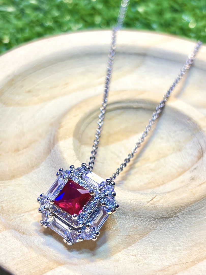 Ruby Pendant Necklace (Category: Necklaces) located in Davao. Submitted by emmanuelchuamellorin23 (Listing ID 1439376526, Image 3). Description: ❤️RUBY NECKLACE❤️ Size 16-18inches Markings PT950pendant Au750 chain UV REACTIVE💯 Message me directly📩- Stunning ruby pendant necklace. - Features a vibrant red ruby. - Accented with sparkling white stones. - Delicate silver chain. - Secure AU750 clasp. - Ideal for special events or daily wear..