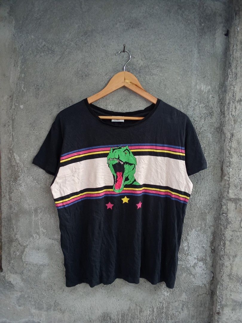 Saint Laurent Paris Ss17 Dinosaur Tee (Category: Luxury Apparel) located in Tabaco. Submitted by rebirthalley (Listing ID 1439261419, Image 2). Description: W-21 L-24 Excellent Condition No flaws 2180.