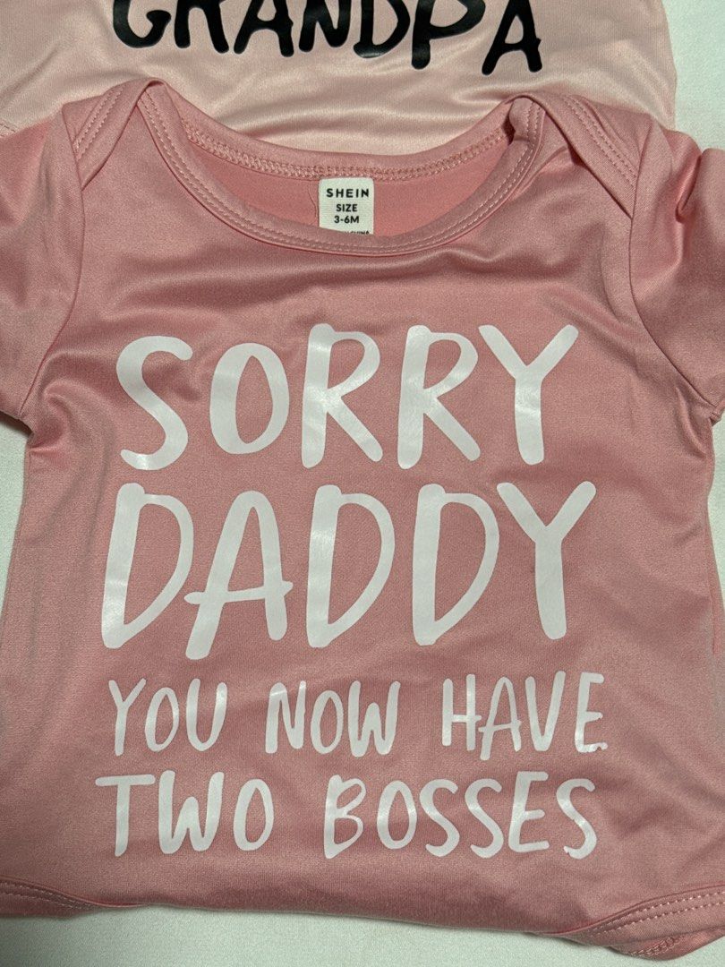Shein Baby Bodysuits 3-6M (Category: Babies & Kids Fashion) located in Bulacan. Submitted by jkrv15 (Listing ID 1439419798, Image 3). Description: - Brand: Shein - Size: 3-6 months (up to 7-8 months) - Set includes two short-sleeved pink bodysuits: - "I ❤️ My Grandma & Grandpa" design - "Sorry Daddy You Now Have Two Bosses" design.