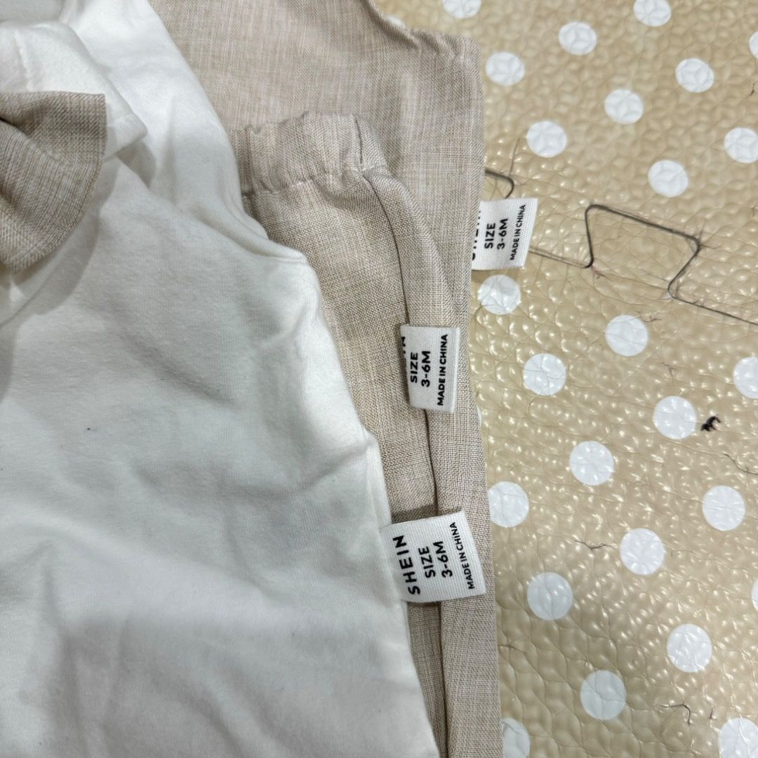 Shein Baby Clothes 3-6M (Category: Babies & Kids Fashion) located in Manila. Submitted by louvemaria (Listing ID 1439295040, Image 2). Description: - Shein baby clothes set - Size: 3-6 months - Includes: - White outfit - Beige outfit - Made of light, breathable fabric - Ideal for your baby.
