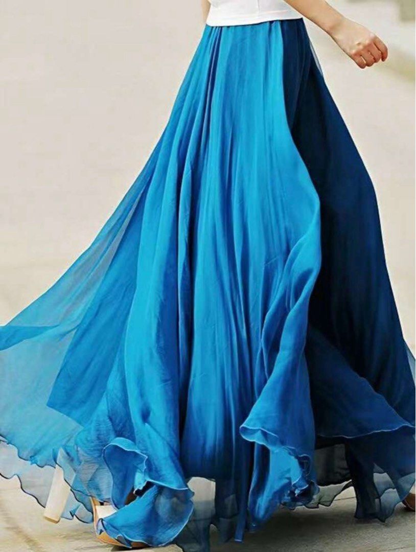SHEIN Chiffon Skirt (Category: Skirts) located in Quezon City. Submitted by buttercup0100 (Listing ID 1439400739, Image 1). Description: - Peacock Color maxi skirt - Flowing, lightweight design - Sheer, airy fabric - Ideal for beach cover-up or summer outfit - Comfortable fit - Flattering silhouette.