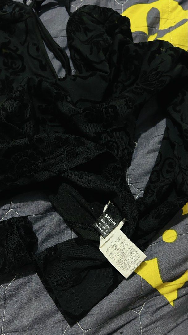 Shein Floral Long Sleeve Top (Category: Longsleeves) located in Manila. Submitted by alyssaaaamm (Listing ID 1439397758, Image 2). Description: Shein long sleeve top with a floral pattern. Features a V-neckline and a tie-up back. The top has a cropped design. Y2K design The size is XS/S. The color is black..