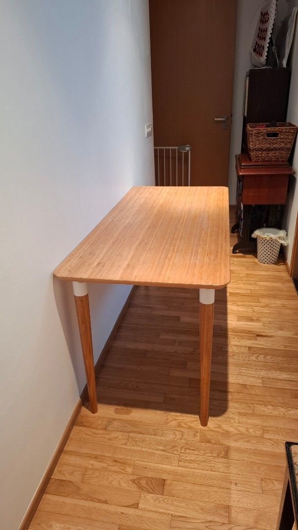 Solid wood table (Category: Tables & Sets) located in Singapore. Submitted by neevybee (Listing ID 1439251777, Image 1). Description: - Ikea ( Lisabo) - Light wood finish (Ash veneer) - Tapered legs - Solid construction.