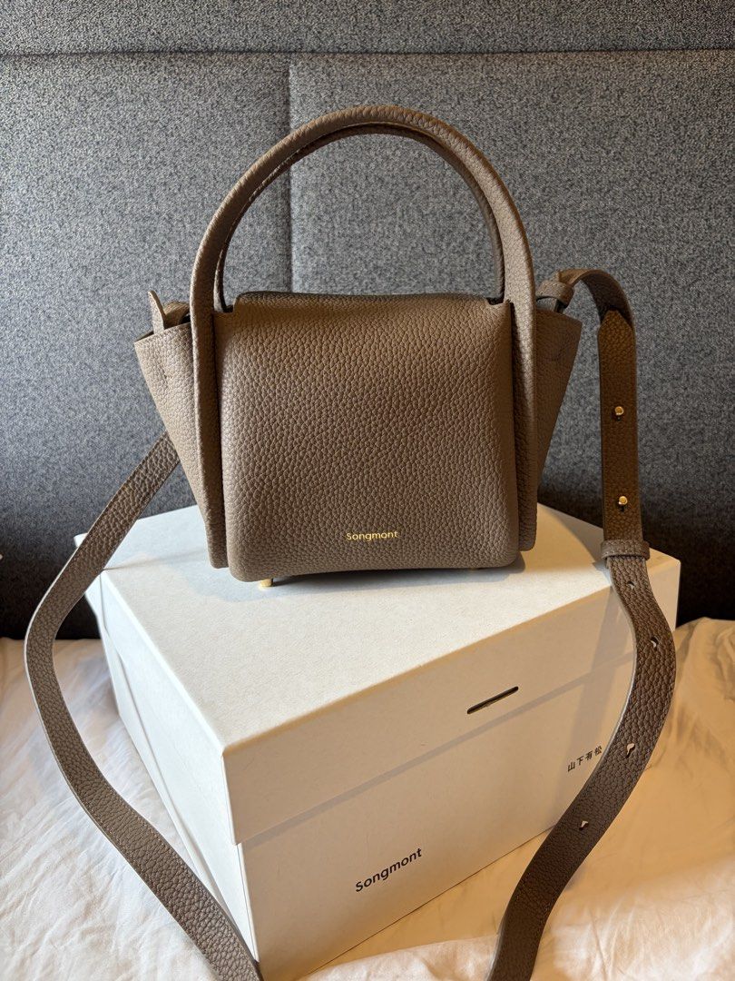 Songmont Song Bag (Category: Luxury Bags & Wallets) located in Las Pinas. Submitted by zcloset.ph (Listing ID 1439360189, Image 1). Description: Complete inclusions Rfs: decluttering .