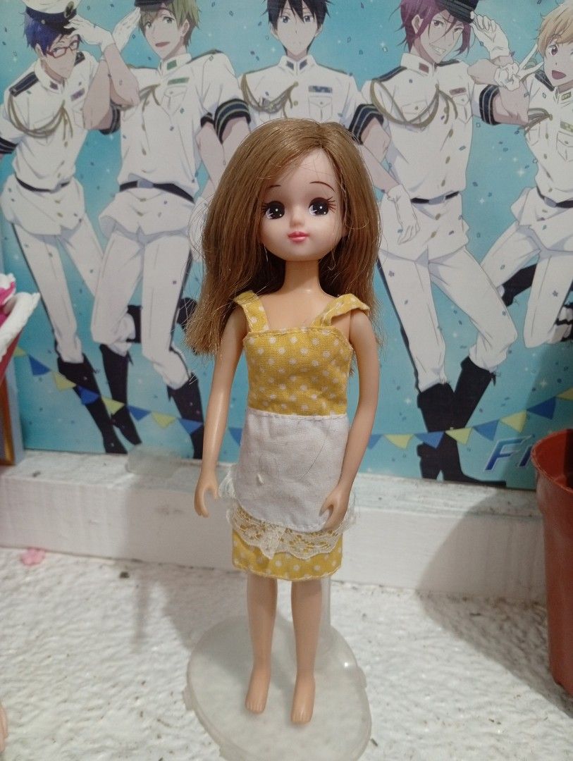 Takara Licca Chan doll (Category: Figurines & Statues) located in Manila. Submitted by thecraft240 (Listing ID 1439296152, Image 1). Description: - Yellow dress with white polka dots.White apron with lace detailing - stand Not included -joints wires still bend flaws Lip chip possible haircut .
