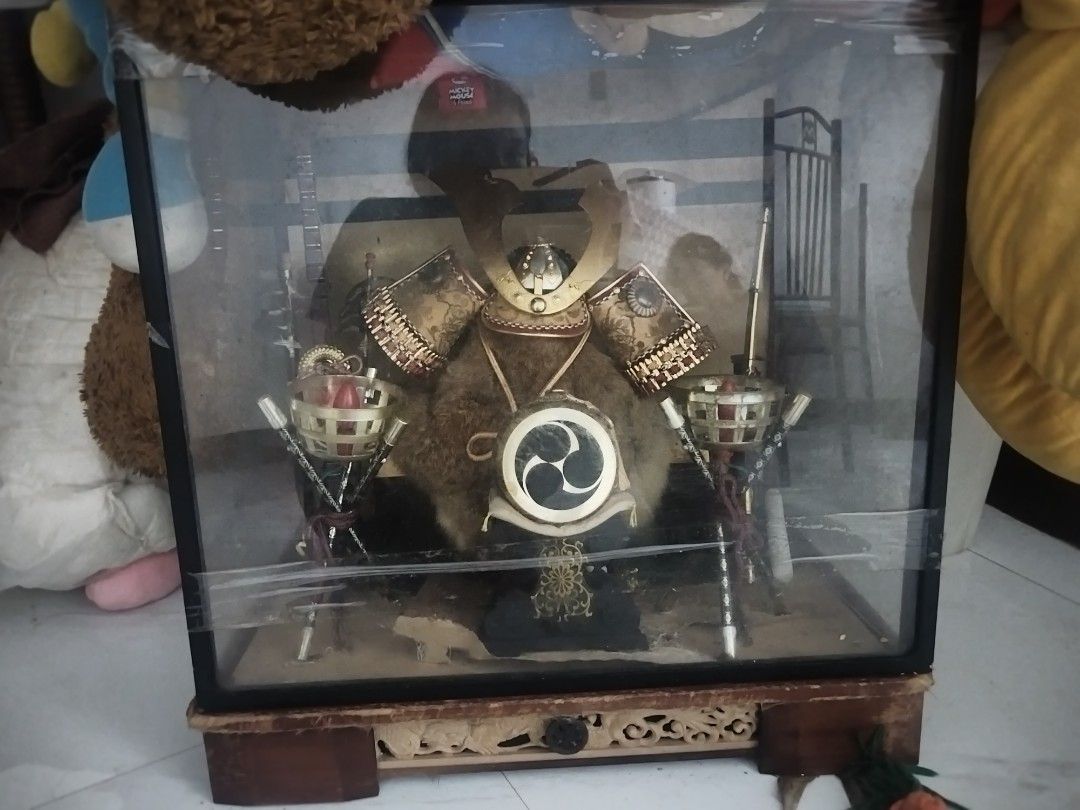 Take all: Vintage Japanese Dolls Display Case (Category: Vintage Collectibles) located in Manila. Submitted by everythingmustgo.18 (Listing ID 1439355196, Image 2). Description: - Japanese doll display case - Includes two dolls in traditional attire - Features miniature instruments and a fan - Wooden frame with a glass front - Gold-colored fabric background 2. Vintage Japanese Girl 3. Vintage Japanese Geisha Free: - samurai armor set display case