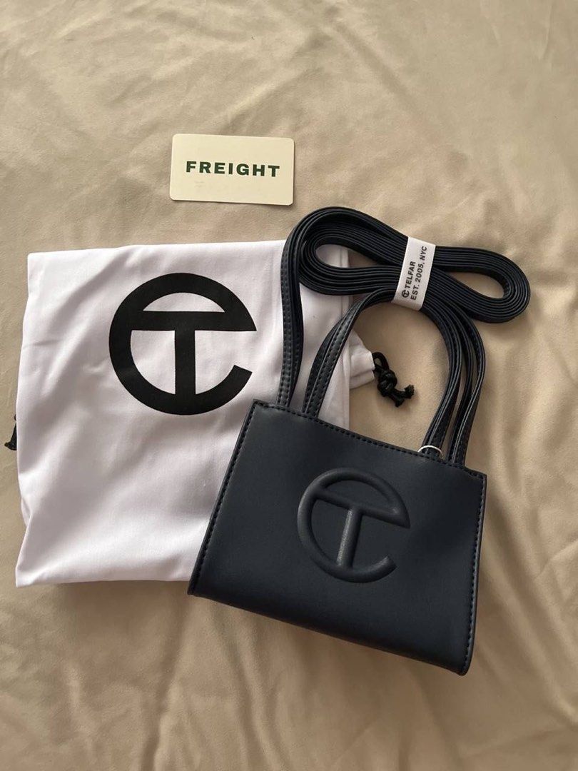 Telfar Shopping Bag Small Navy (Category: Shoulder Bags) located in Quezon City. Submitted by ejay75 (Listing ID 1439252658, Image 1). Description: - Authentic Telfar Small Shopping Bag - Navy blue exterior - Telfar logo embossed - Includes dust bag - Detachable strap - Top handles and shoulder strap - Ideal for everyday use.