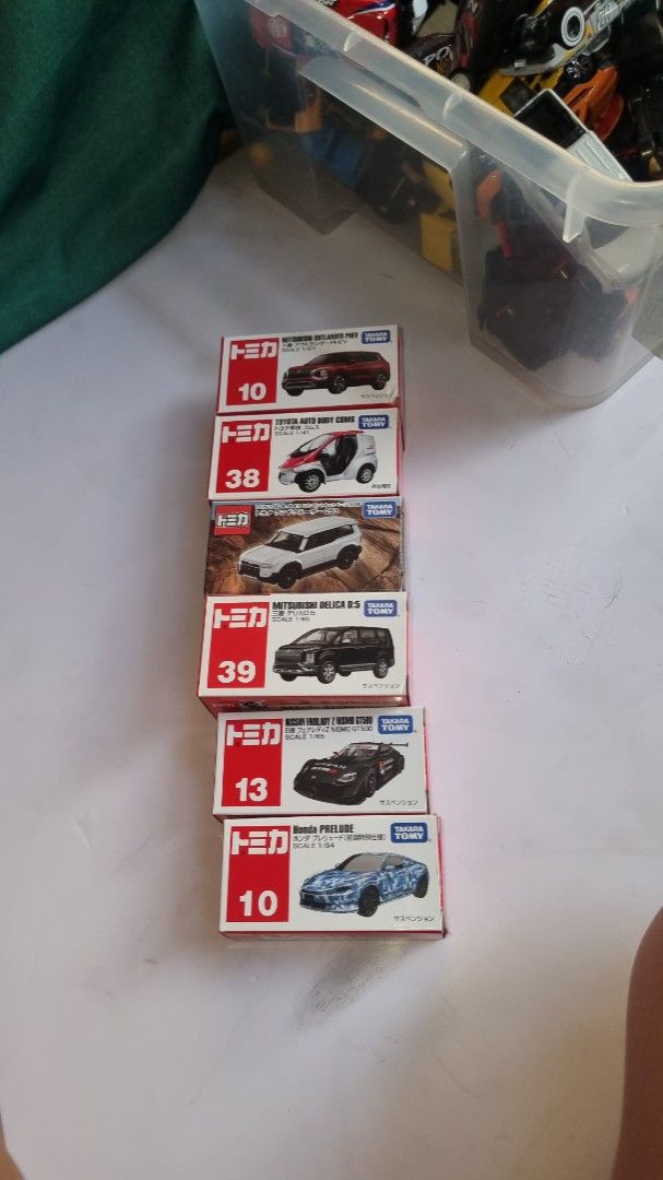 Tomica Diecast Cars - Assorted Models (Category: Vehicle & Diecast Models) located in Quezon City. Submitted by aphroditedolliesangel (Listing ID 1439314487, Image 1). Description: - Tomica diecast car collection - Includes models: 10, 38, 39, and 13 - Cars are in original boxes - Perfect for collectors and gifts - 500 each all original.