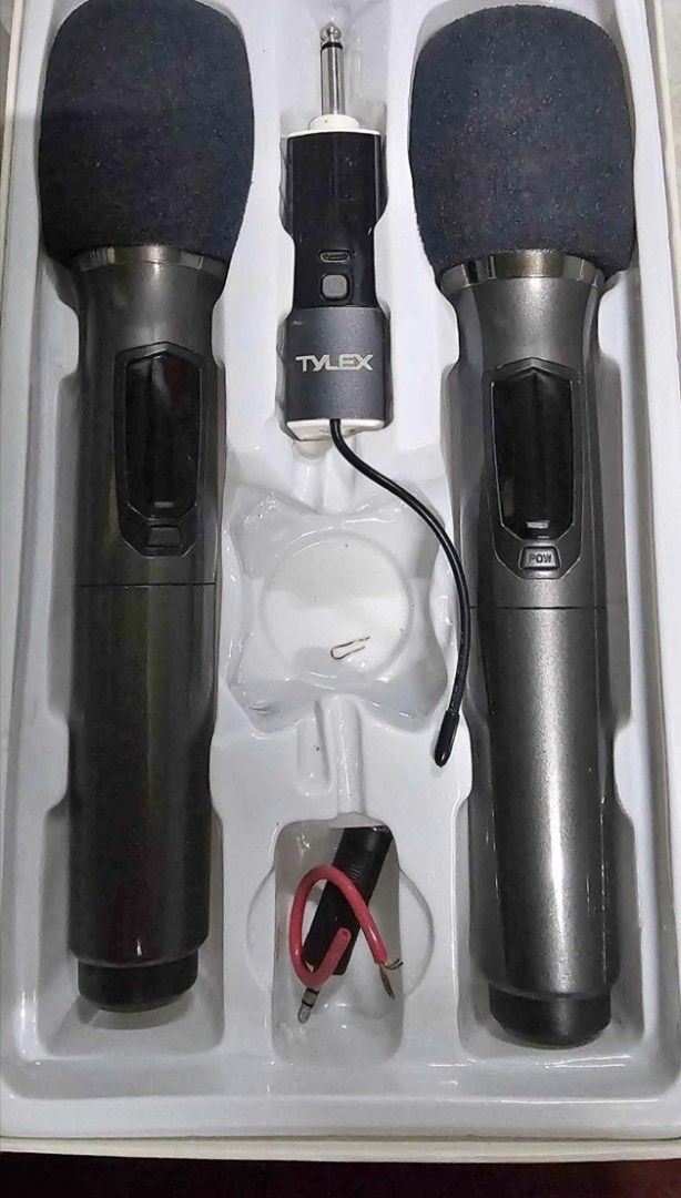 TYLEX X-Y88 Wireless Microphone Set (Category: Microphones) located in Manila. Submitted by kuyaemman (Listing ID 1439322926, Image 1). Description: - TYLEX wireless microphone set - Includes two microphones - Comes with a receiver and connecting cable - Features black foam microphone covers - Complete and ready to use - Ideal for karaoke, presentations, and events requiring clear audio 2k nalang bago pa.