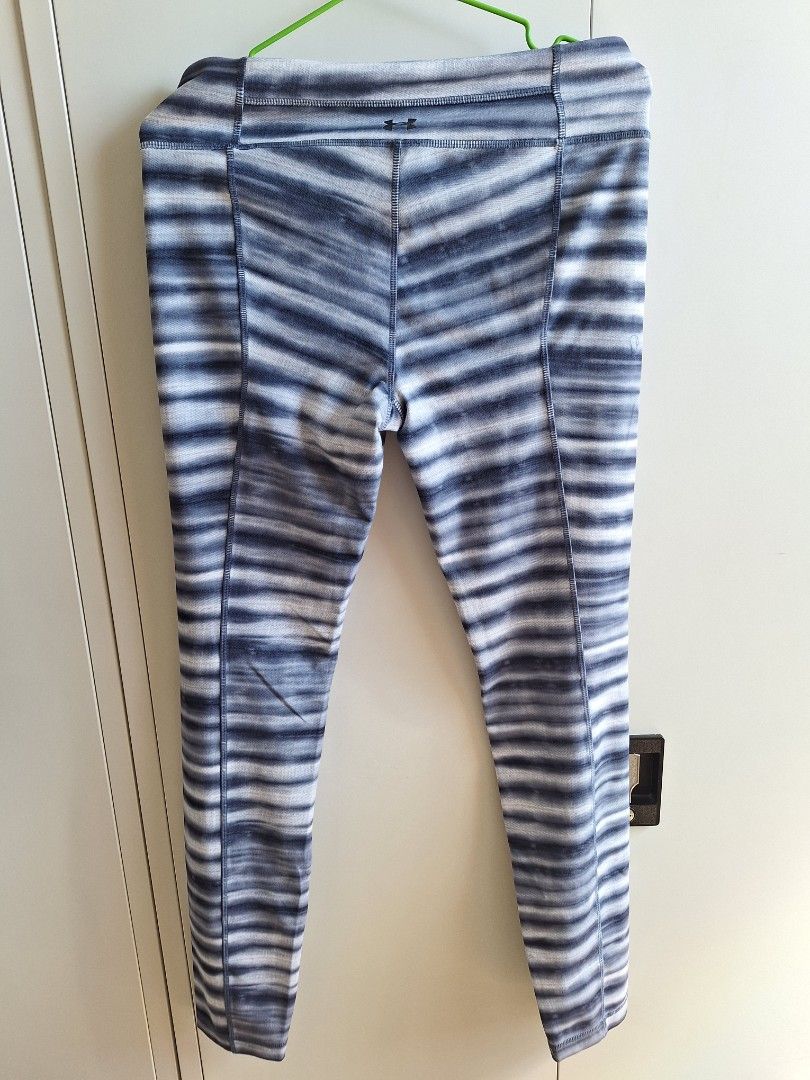 Under Armour Striped Leggings (Category: Activewear) located in Quezon City. Submitted by andycandy2011 (Listing ID 1439266876, Image 2). Description: - Under Armour leggings - Blue and white striped pattern - High-waisted design - Convenient side pocket - Good for waist size 30 to 32inches - Offers both comfort and style - Features the Under Armour logo.