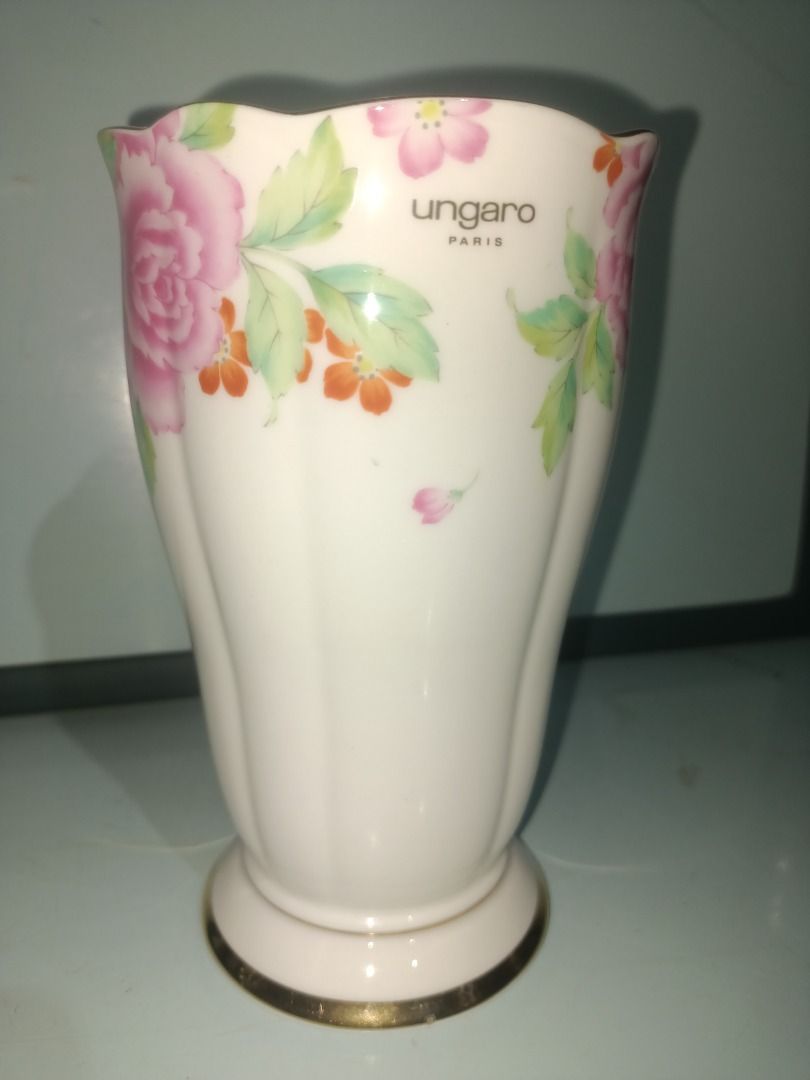 Ungaro Paris Floral Cup (Category: Coffee & Tea Tableware) located in Munoz. Submitted by larryc1212 (Listing ID 1439392115, Image 1). Description: - Ungaro Paris Vase - Delicate floral design - Scalloped rim with gold trim - Gold-trimmed base - Approximately 6.5 inches tall - Marked "Ungaro Paris Maebata Japan" Disclaimer: Item may include some scratches due to age, as is were is basis Item can be pick up in our Japan surplus shop located in Mun