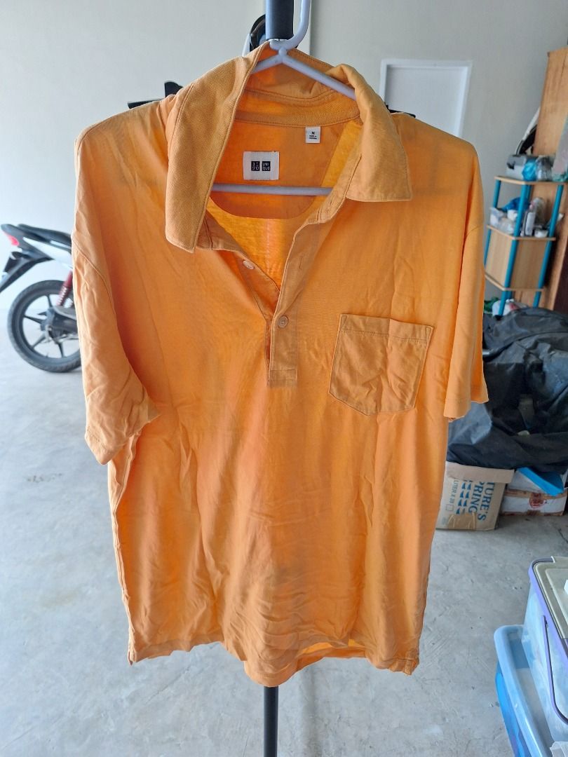 Uniqlo Orange Polo Shirt - Medium (Category: Tshirts & Polo Shirts ) located in Malaybalay. Submitted by mags_sofia (Listing ID 1439377070, Image 1). Description: Features: - Chest pocket - Collared neckline - Short sleeves - Button-up placket MOP: GCash, BPI Transfer MOD: LBC COP (SF is paid upon pickup); J&T (initial payment is 100 pesos; increment and decrement are processed after item is shipped) SF: c/o buyer, ships from Malaybalay City, Buk