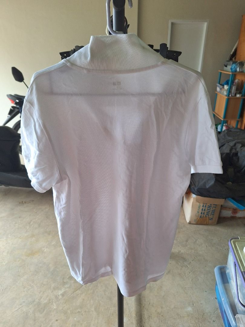 Uniqlo White Polo Shirt (Category: Tshirts & Polo Shirts ) located in Malaybalay. Submitted by mags_sofia (Listing ID 1439375352, Image 2). Description: - Features: Classic collar, short sleeves, v-neck - Material: Polyester-cotton blend - Made in Vietnam - Condition: Visible stains MOP: GCash, BPI Transfer MOD: LBC COP (SF is paid upon pickup); J&T (initial payment is 100 pesos; increment and decrement are processed after item is shipped) SF: c/