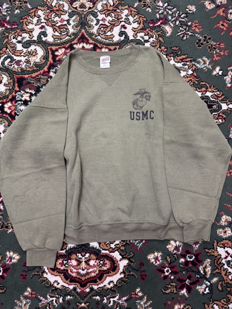 USMC Olive Green Crewneck Sweatshirt (Category: Coats, Jackets and Outerwear) located in Manila. Submitted by tropical.ivy_ph (Listing ID 1439354604, Image 1). Description: - Olive green crewneck sweatshirt - Ribbed collar, cuffs, and hem - Soft, comfortable fabric - Relaxed fit - Perfect for layering - Versatile for casual wear - Actual measurements: 25 inches wide 26 inches long Pick up: Makati City.