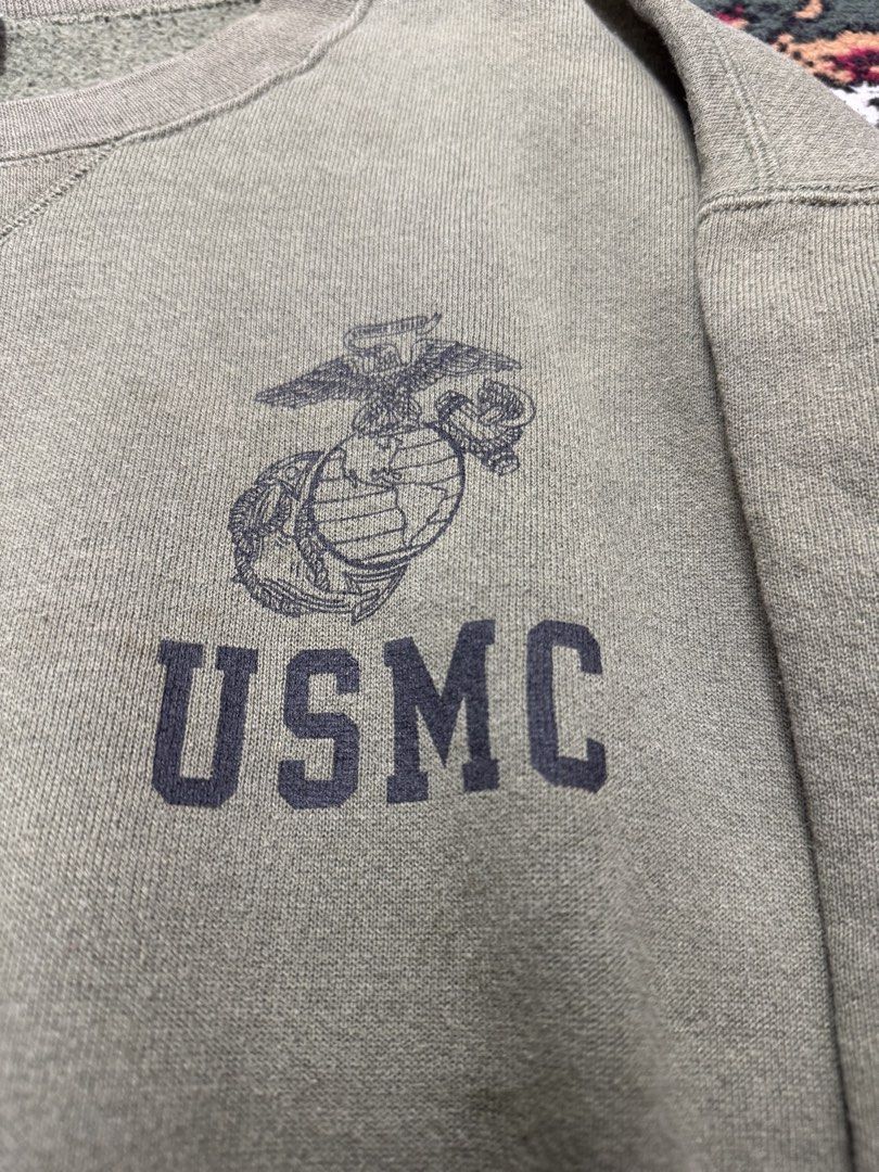 USMC Olive Green Crewneck Sweatshirt (Category: Coats, Jackets and Outerwear) located in Manila. Submitted by tropical.ivy_ph (Listing ID 1439354604, Image 2). Description: - Olive green crewneck sweatshirt - Ribbed collar, cuffs, and hem - Soft, comfortable fabric - Relaxed fit - Perfect for layering - Versatile for casual wear - Actual measurements: 25 inches wide 26 inches long Pick up: Makati City.