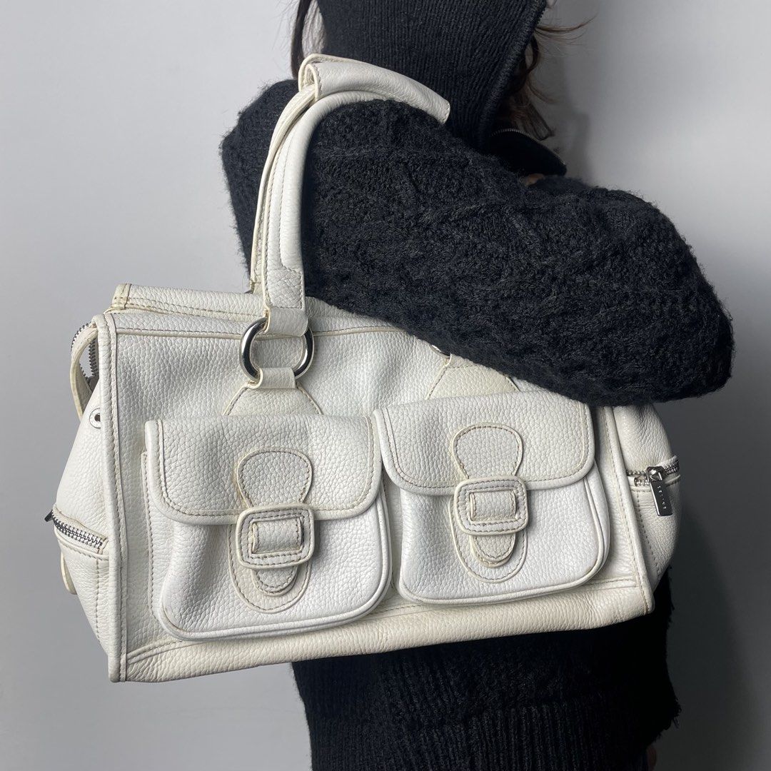 CELINE White Grained Calfskin Leather Shoulder Bag (Category: Luxury Bags & Wallets) located in Baguio. Submitted by metro_studio (Listing ID 1439367011, Image 1). Description: White calfskin grained leather, silver hardware and suede interior In excellent condition .