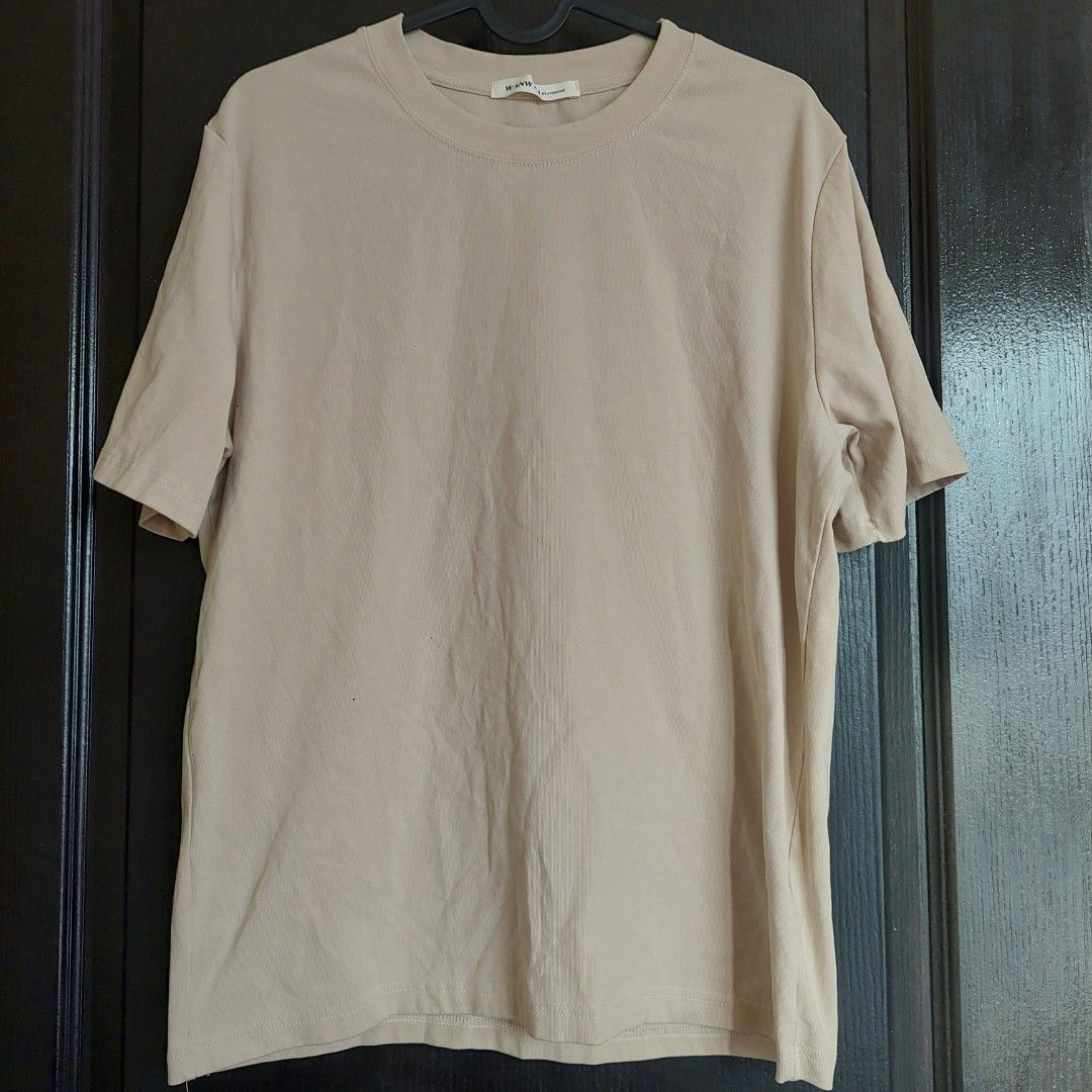 Wanwan Beige T-shirt (Category: Tshirts & Polo Shirts ) located in Quezon City. Submitted by forgetmenot.ph (Listing ID 1439377416, Image 1). Description: Wanwan beige tan crew-neck tee shirt Condition: 9/10 Measurements (flat lay): Bust - 20.5" Length - 25" Best fits sizes medium to large..