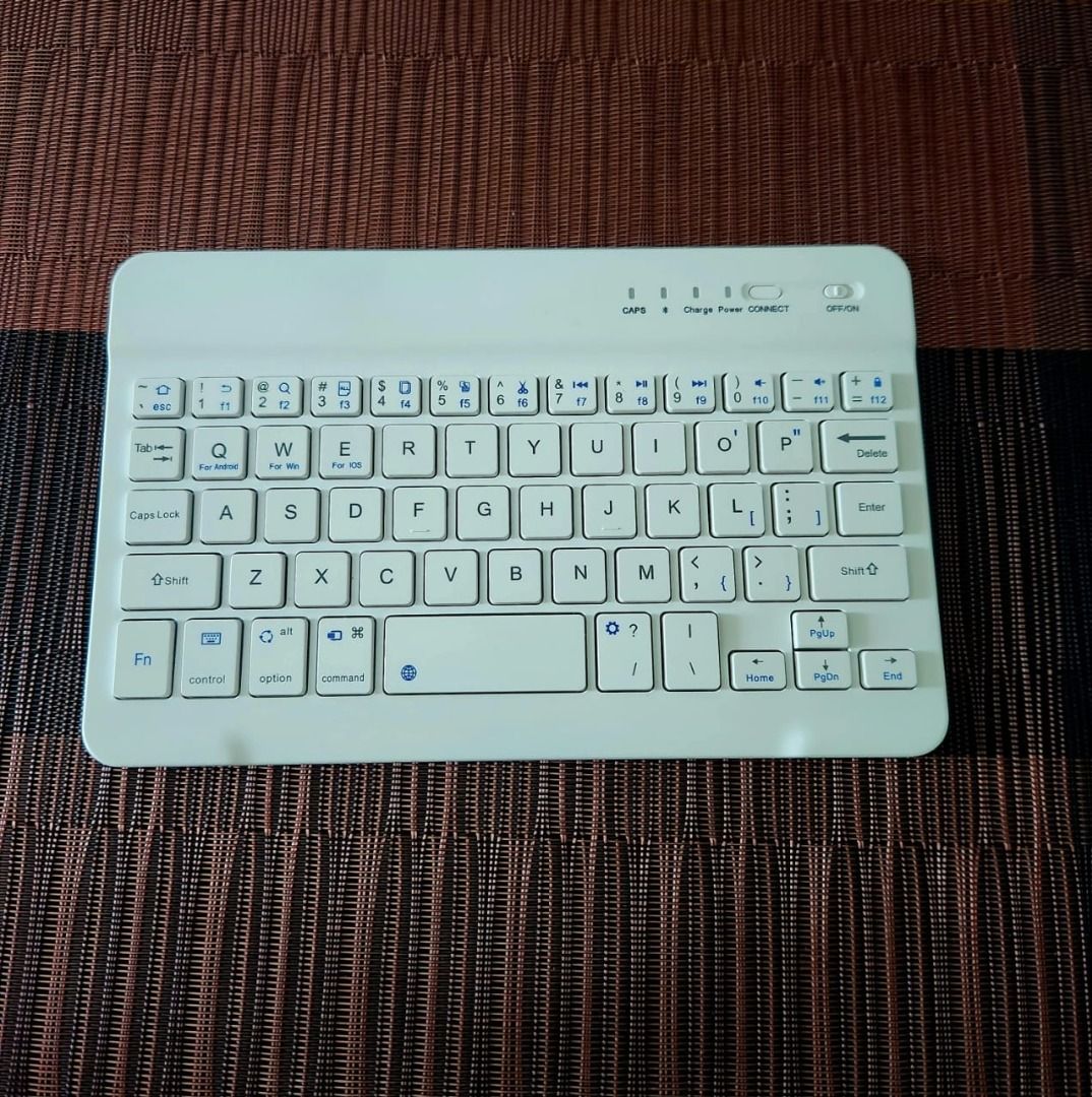 White mini keyboard and Pink Wireless Mouse460941986470963200