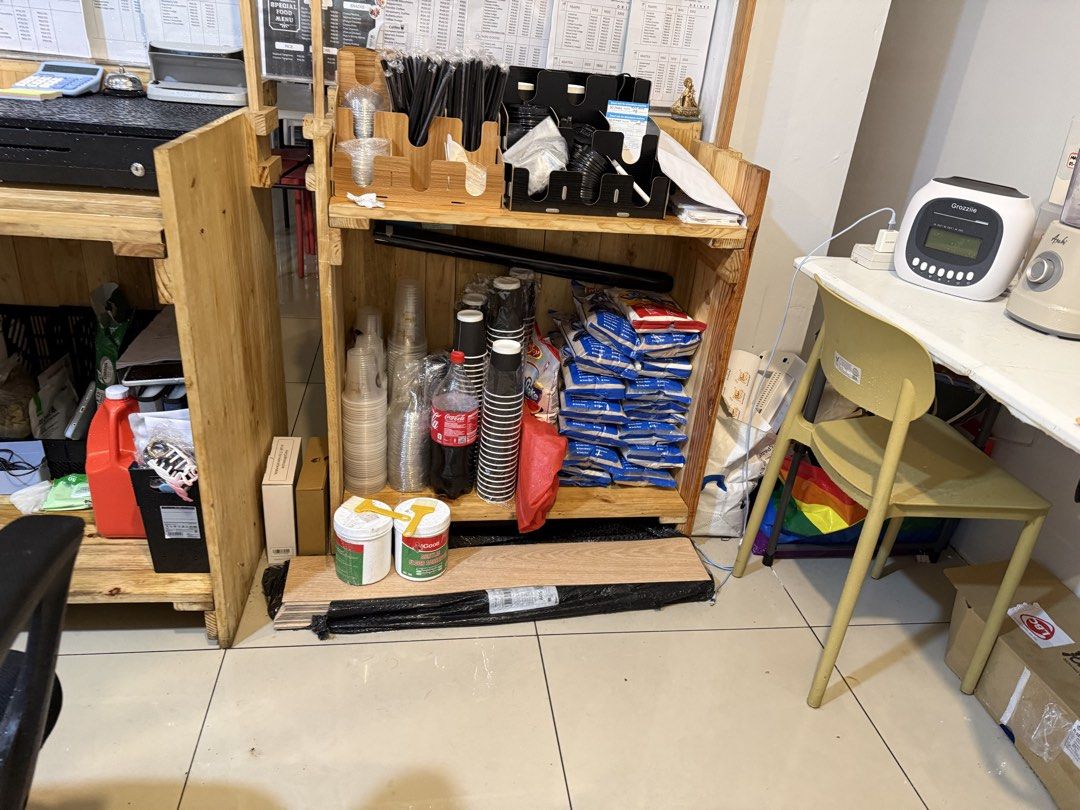 Wooden Stall with Shelves (Category: Outdoor Furniture) located in Makati City. Submitted by beguiling (Listing ID 1439276094, Image 2). Description: - Wooden stall - Includes counter and shelves - Features top frame - Lower counter area - Multiple shelves for storage - Natural wood finish - Ideal for retail or display.
