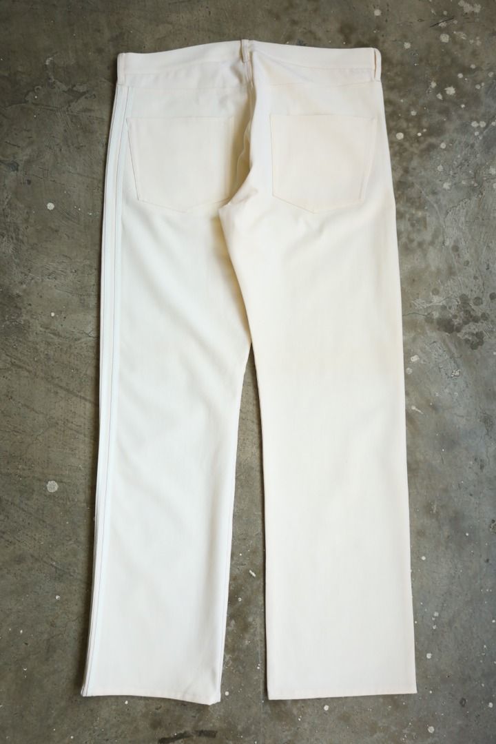 Y-3 - S/S 04 - Three Stripe Trousers (Category: Trousers) located in Manila. Submitted by graymatter_ (Listing ID 1439347077, Image 3). Description: Y-3 - S/S 04 - Three Stripe Trousers Tagged Size: M Condition: BN w/ Tags Flaws: Yellow Dot Stains Material: 98% Lana Wool, 2% Polyurethane Made in: China Dimensions Waist: 37 Inseam: 33 Crotch: 12.5 Thigh: 13 Leg Opening: 9.5 .