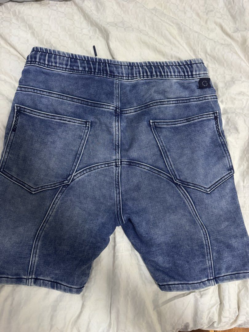 Zara Denim Shorts - Size L (Category: Shorts) located in Valenzuela. Submitted by fitsfromsean (Listing ID 1439271465, Image 2). Description: - Zara denim shorts - Size: L - Features: Elastic waistband, drawstring, 2 front pockets, 2 back pockets, stitched details - Made in Bangladesh - Perfect for casual wear Dimes: Length: 19 Hem: 15.