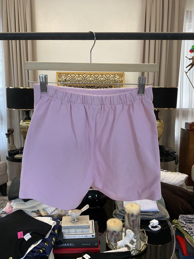 Zara Pink High-Waisted Shorts (Category: Babies & Kids Fashion) located in Antipolo. Submitted by ibyangs_closet (Listing ID 1439284350, Image 2). Description: These stylish pink shorts from Zara feature a high-waisted design with decorative buttons. They have an elastic waistband for a comfortable fit. The shorts are a light pink color and appear to be made of a smooth fabric. The size is indicated as 11-12, corresponding to a CM size of 152. Ma