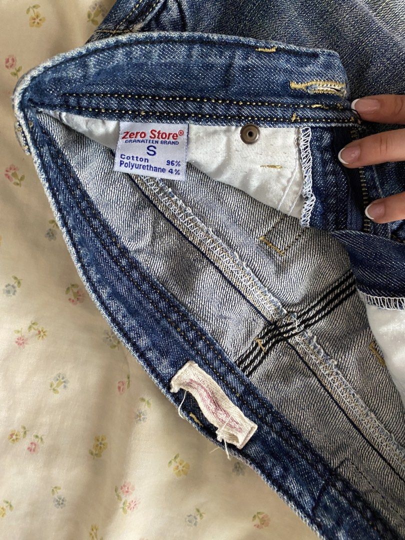 Zero Store Denim Skirt y2k 2000s biker (Category: Skirts) located in San Juan City. Submitted by adore.me (Listing ID 1439291197, Image 3). Description: - Zero Store denim skirt - Size S - Classic five-pocket design - Zip closure - Small zip pocket on front - Faded wash - Red tag detail - Made from cotton and polyurethane blend - size 26.