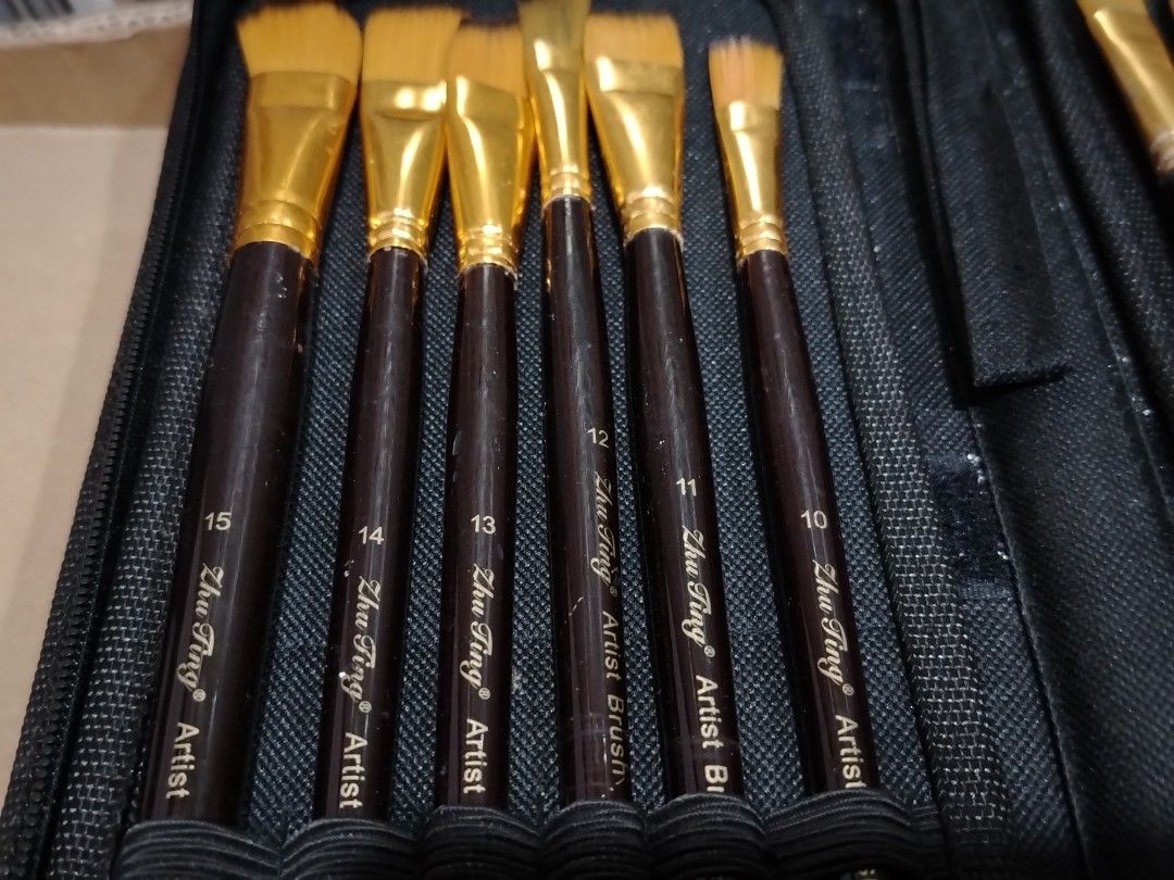 Zhu Ting Artist Brush Set (Category: Makeup) located in Quezon City. Submitted by 09277011179 (Listing ID 1439392659, Image 2). Description: - Zhu Ting artist brush set - Includes brushes sized 3 to 15 - Comes with a black zippered case - Individual slots for secure brush storage - Dark brown handles - Gold-colored bristles - missing 1 and 2 pm for faster transaction buyer shoulders shipping fee.
